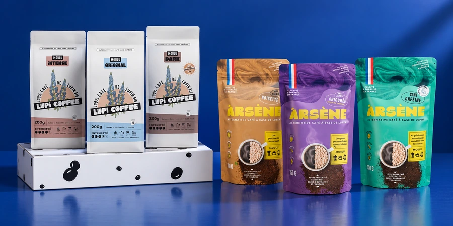 Boîte de découverte blanche Lupi Coffee à côté des sachets Arsène turquoise, ocre et violet